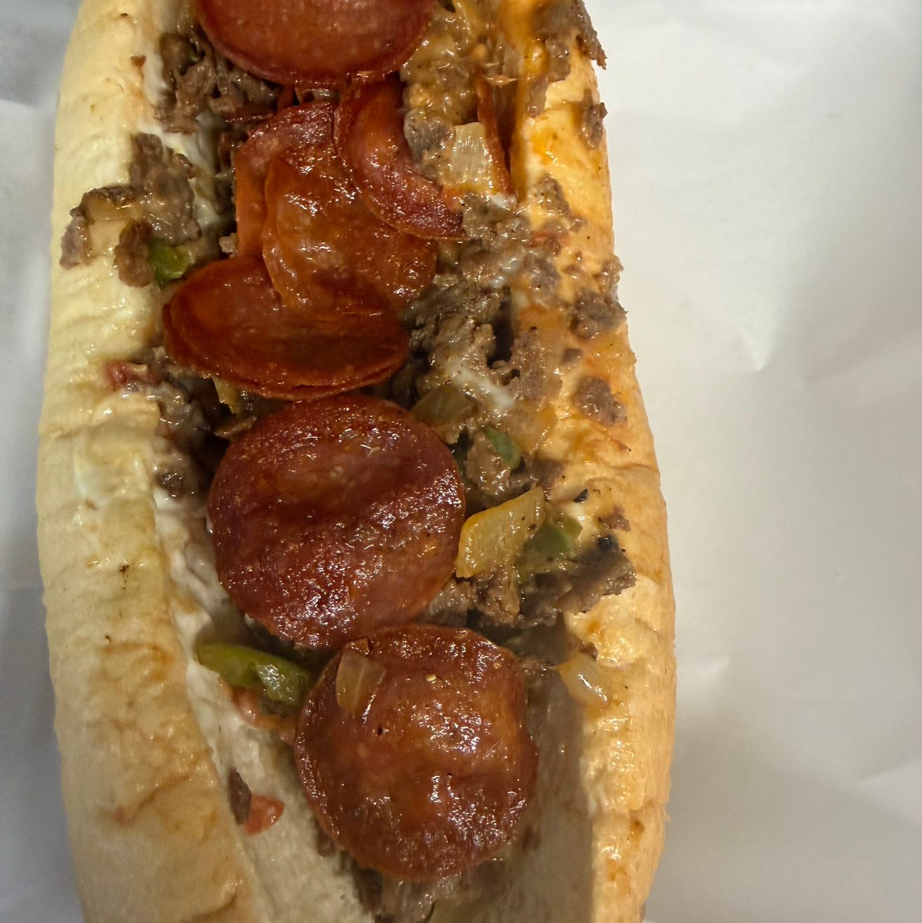 Pizza Cheesesteak.